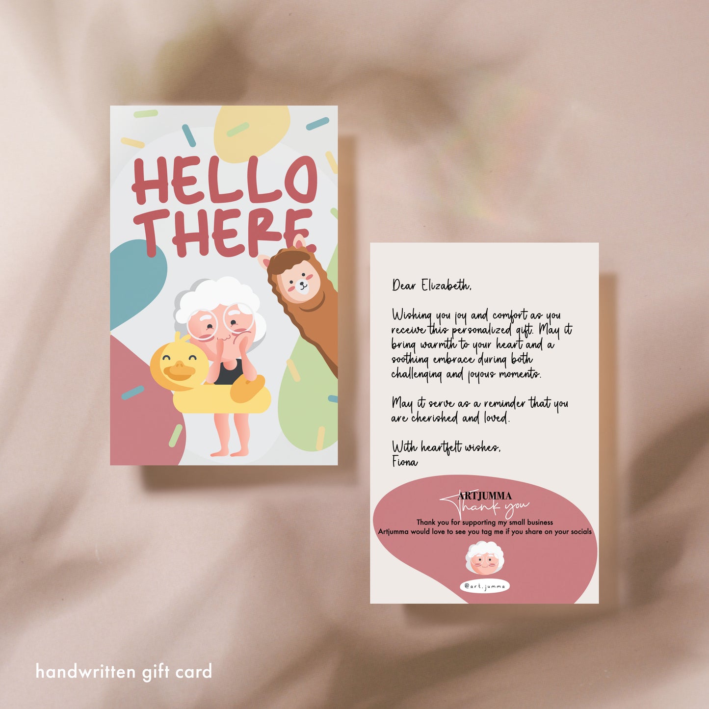 Handwritten gift card with "HELLO THERE" text.
