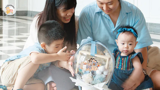 Family looking at a personalized gift globe.