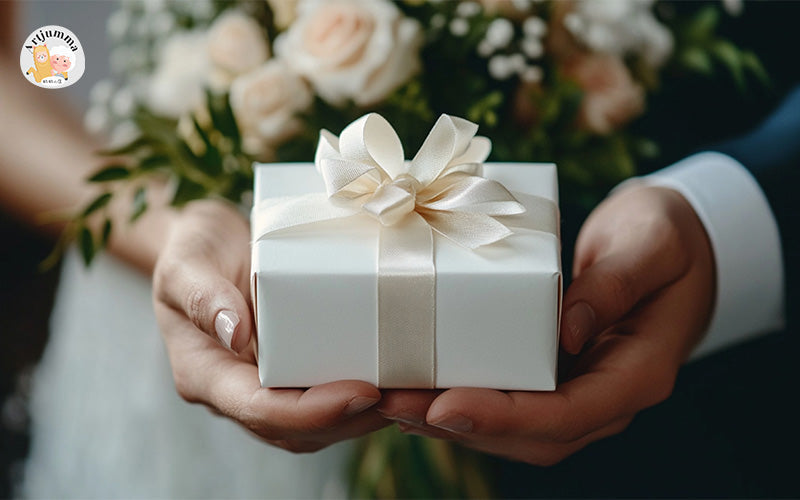 Bride and groom exchanging a simple white wedding gift.