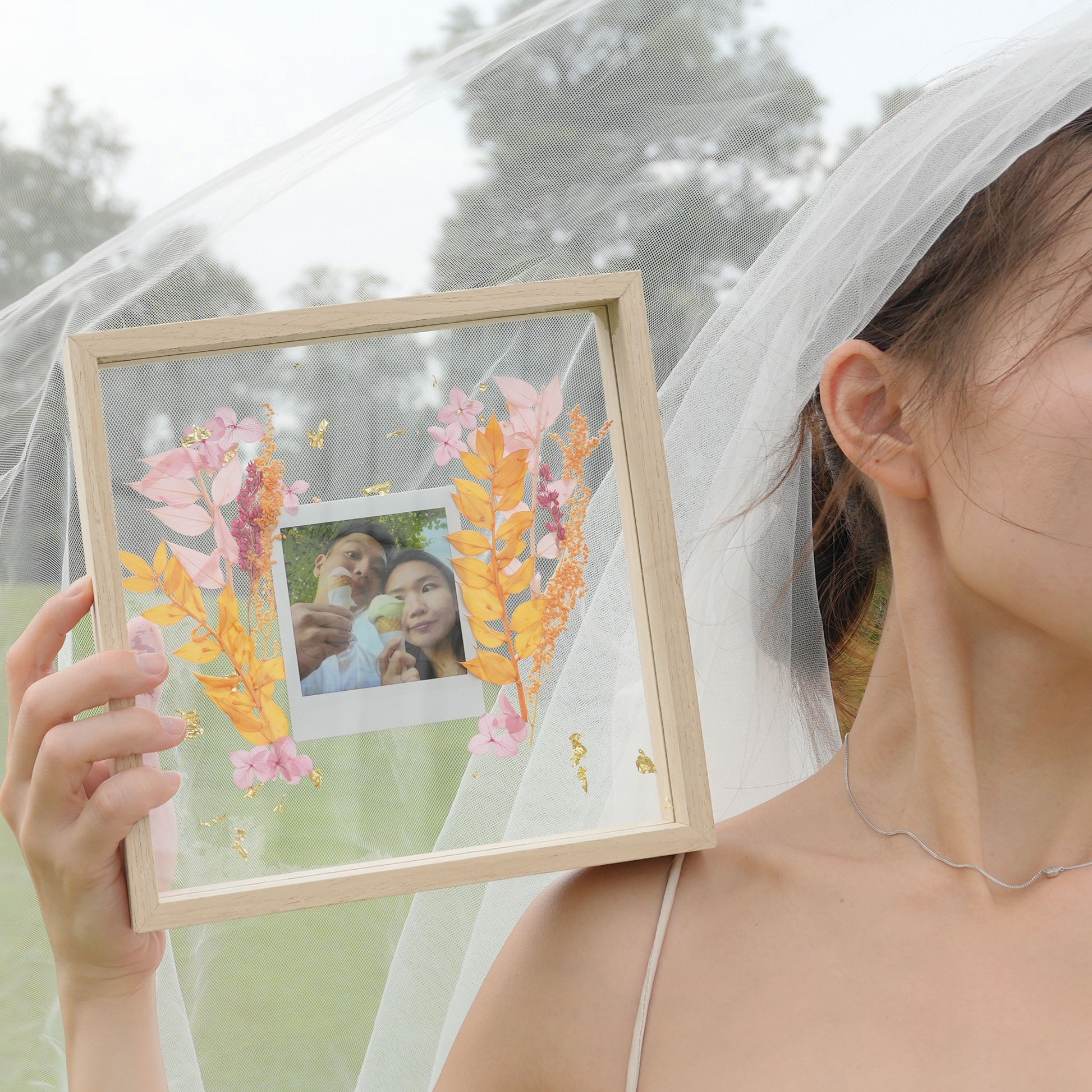 polaroid film and pressed preserved flower
